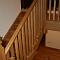 Oak cut string staircase with finials (view2)